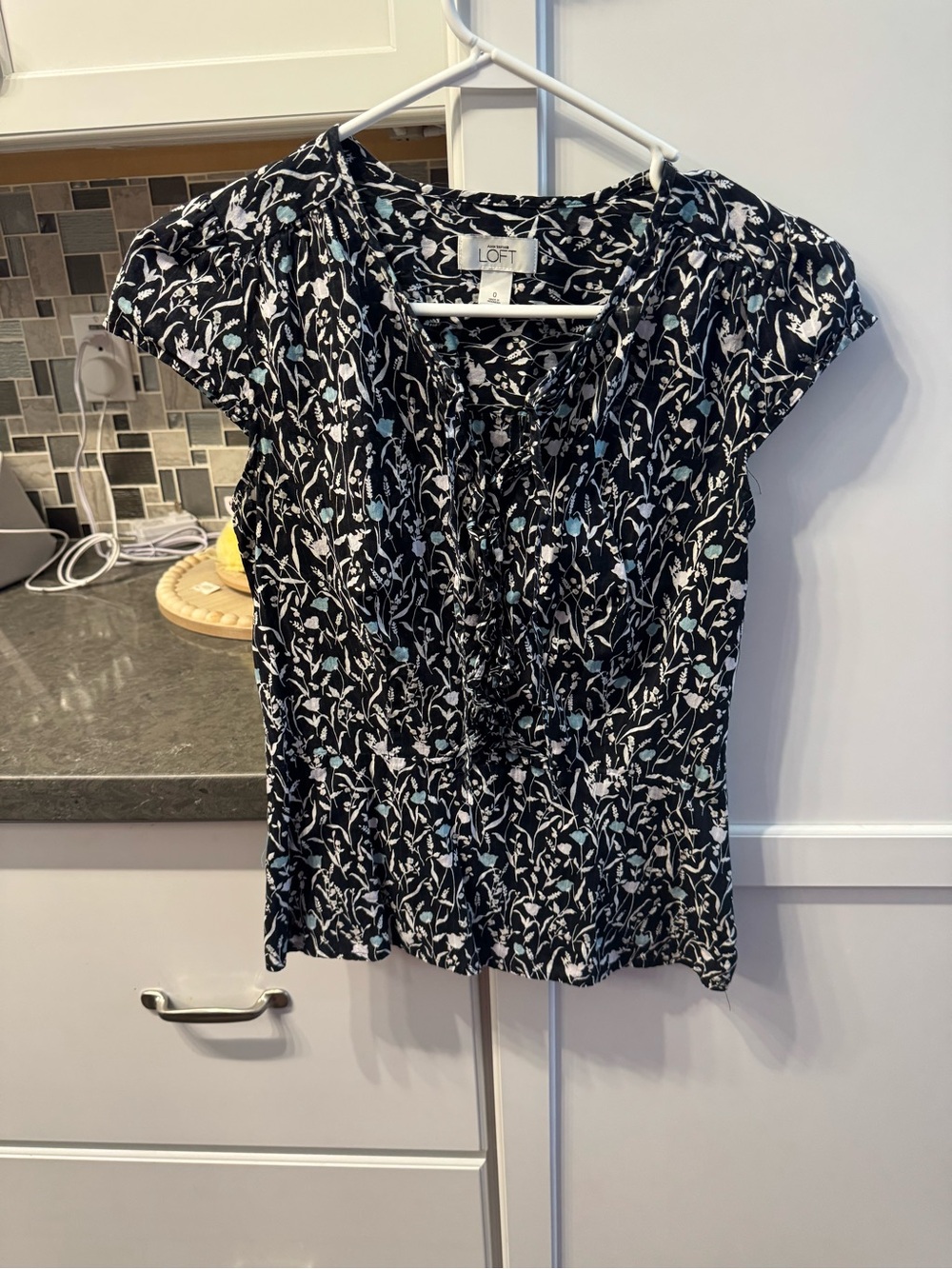 LOFT Black Floral Cap Sleeve V-Neck Blouse with Light Blue Accents